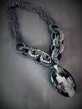 Modern statement necklace black faceted pendant