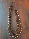Vintage necklace triple strand amber and briwn beads lucite 24" neck opening