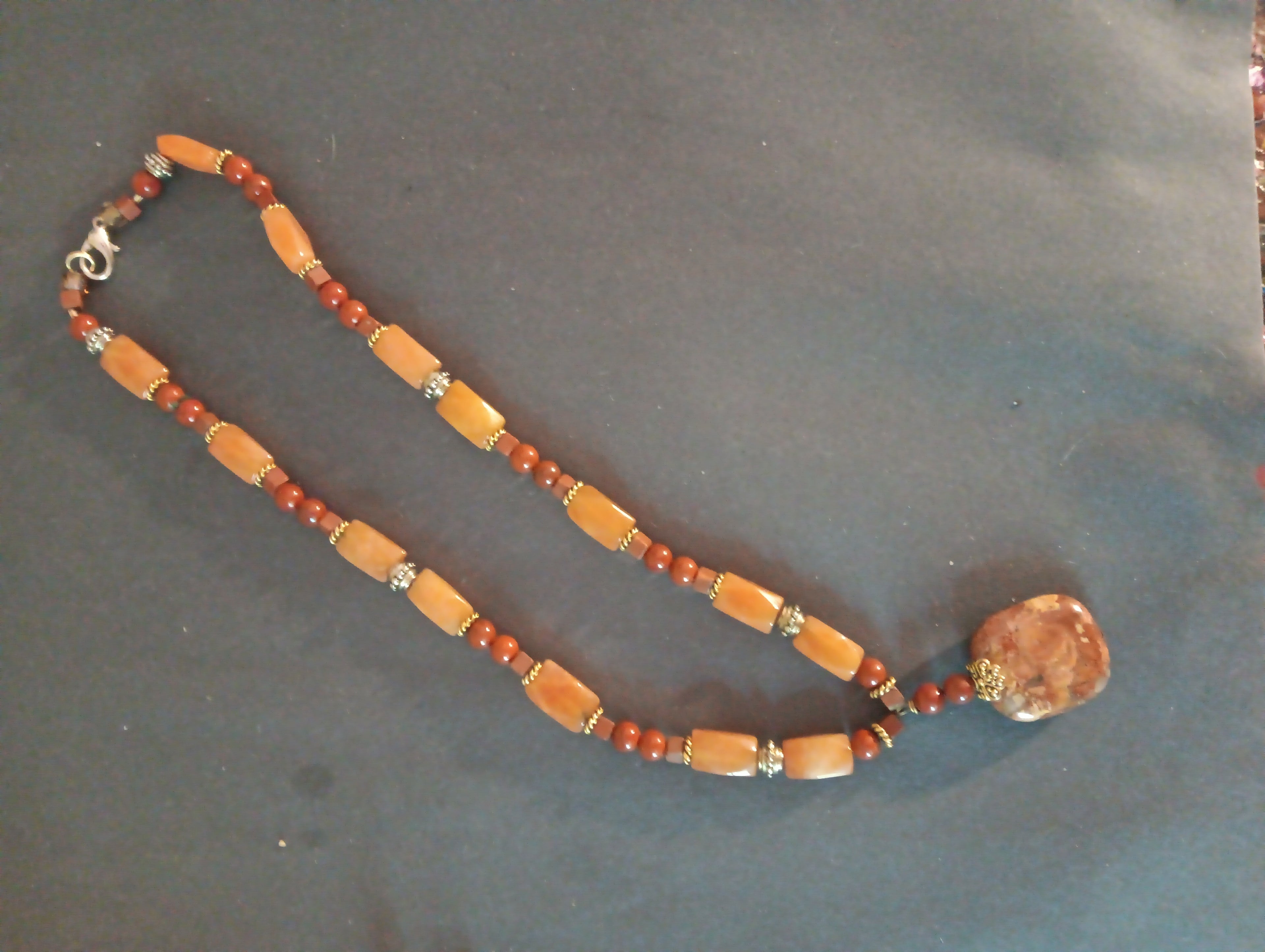 Necklace with pendant carnelian and agate gold and silver spacers