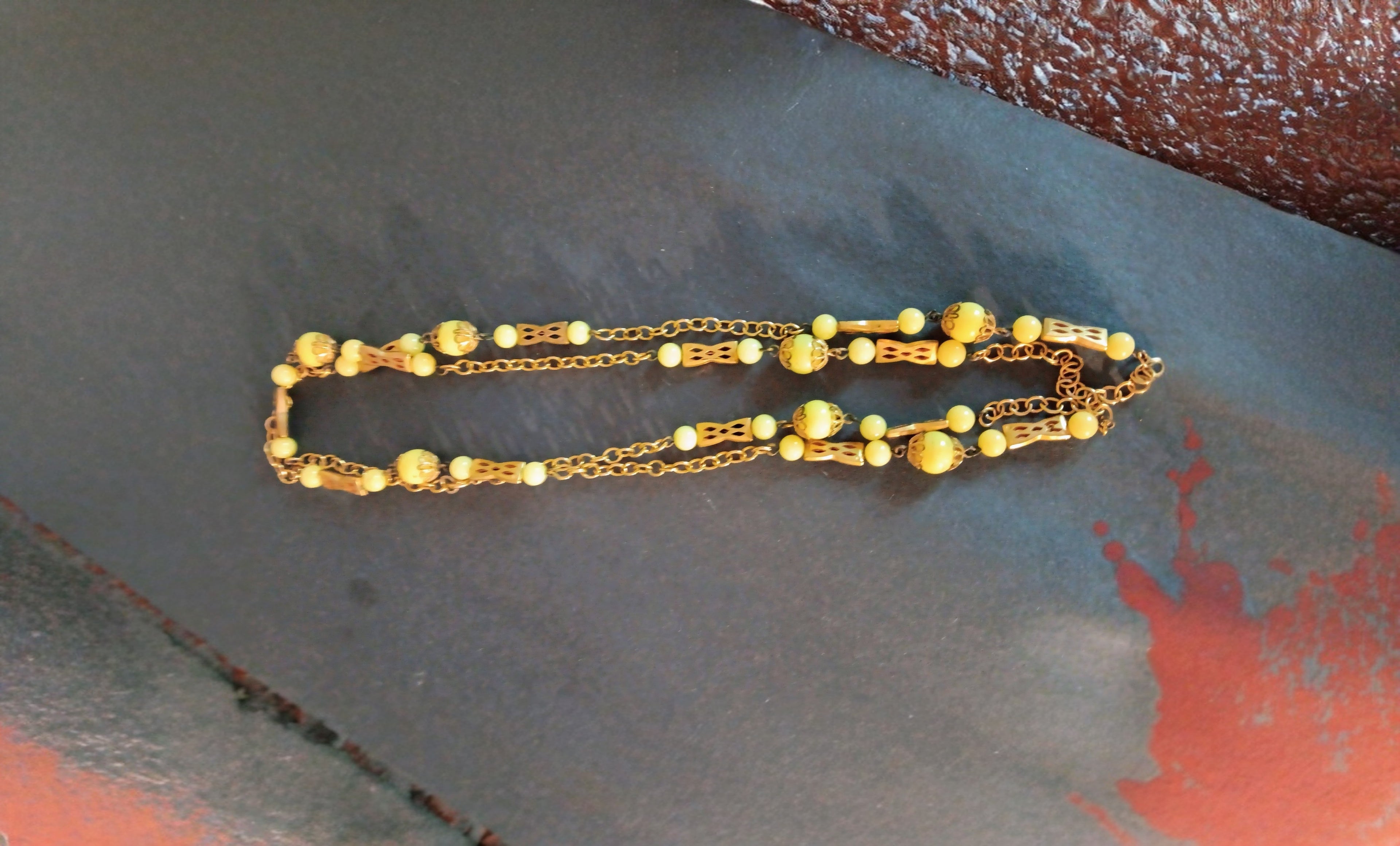 Vintage Santoir necklace gold tone chain and soacers l8ght yellow lucite beads 20"
